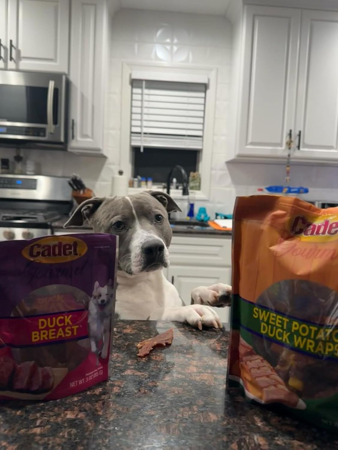 Cadet dog treat bag showing 28 ounces weight label