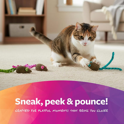 Cat playing with SmartyKat Magic Mice ribbon toy