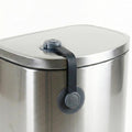 Wappa Baby trash can lock strap front view securing a kitchen garbage bin