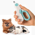 GadgetPawsUSA LED pet nail clipper front view showing the ergonomic white and green handle.