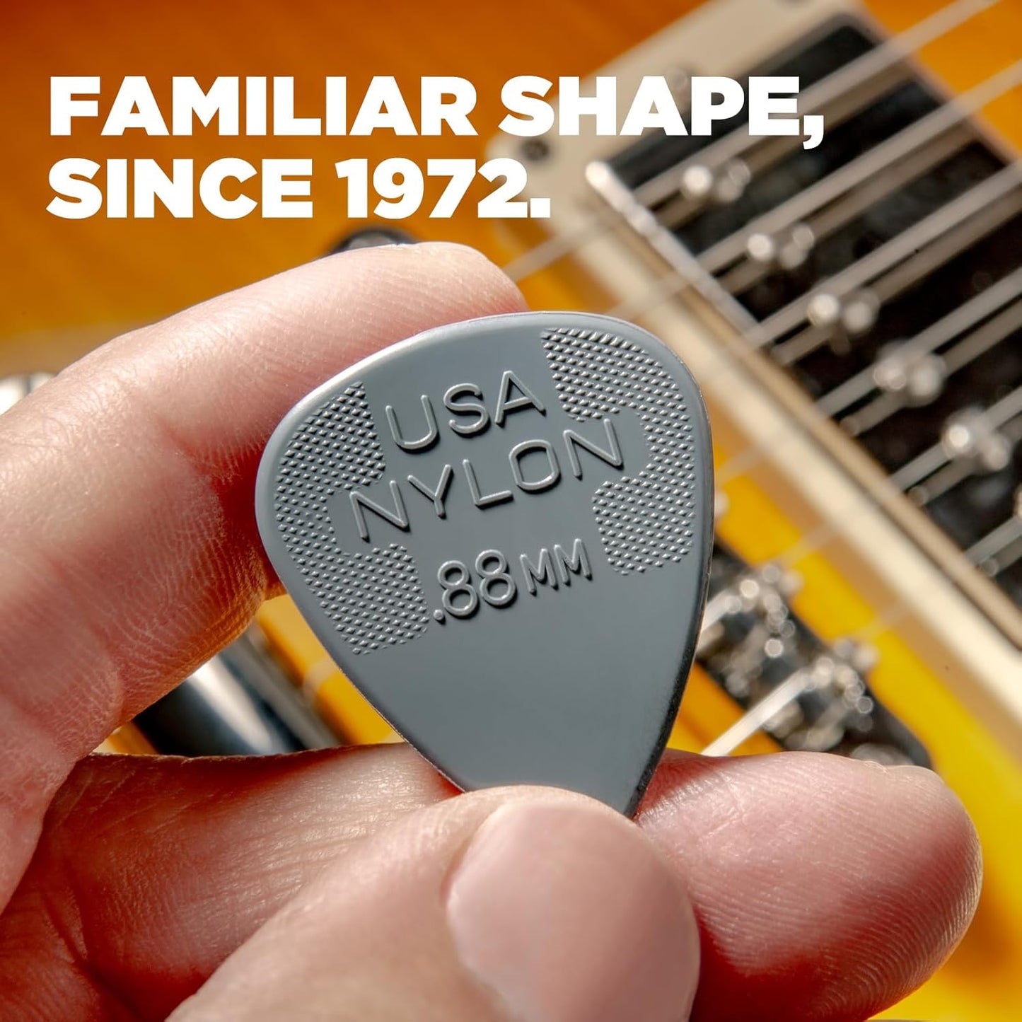 Close up shot of the precision molded rounded edge on the Jim Dunlop thin acoustic guitar pick.