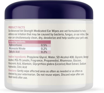 Pet owner using Oticbliss medicated wipe on dog ear