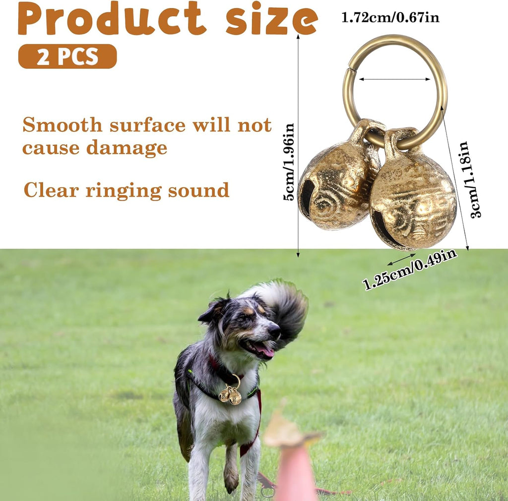 Four pieces of mini brass pet collar tracking bells arranged on a white background.