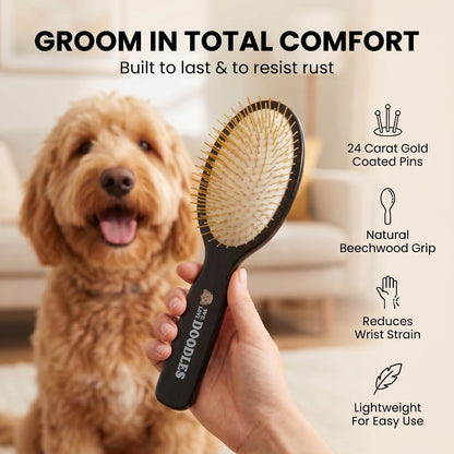 Close up of the twenty seven millimeter gold plated pins on the We Love Doodles dog brush.