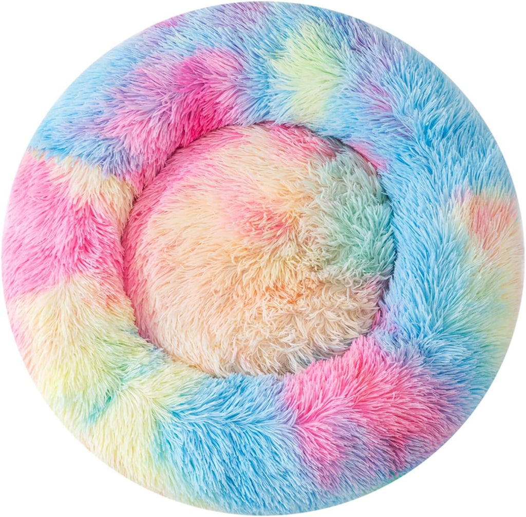 Small cat curled up in a fluffy Finenohoory donut bed