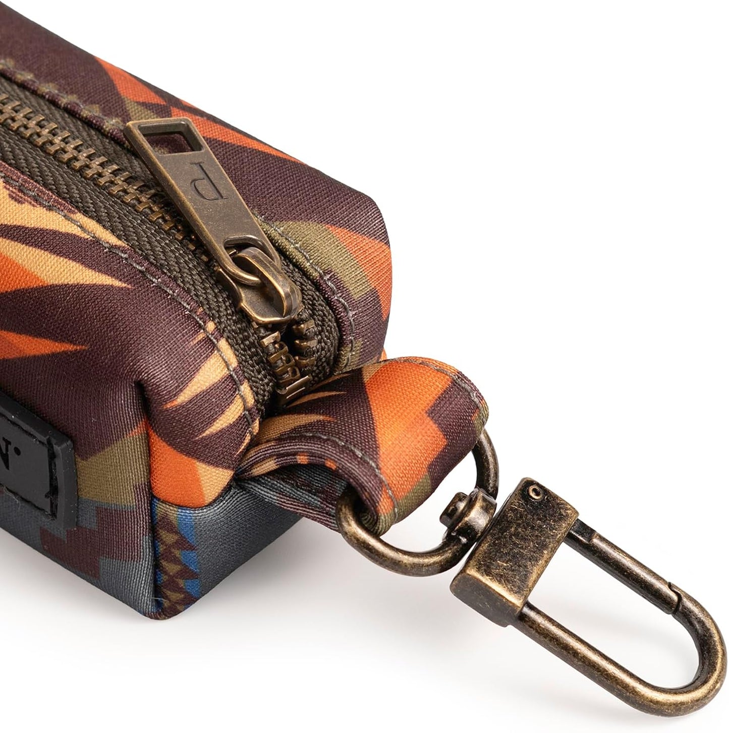 Close up of Pendleton brass hardware and clip on bag dispenser