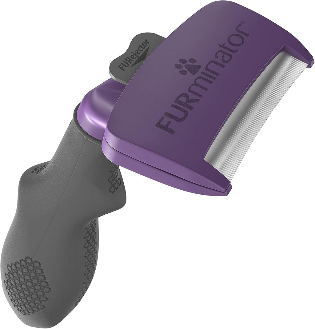 Furminator pet grooming tool showing FURejector button mechanism