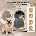 Machine washable dog bed cover being placed into a washing machine.