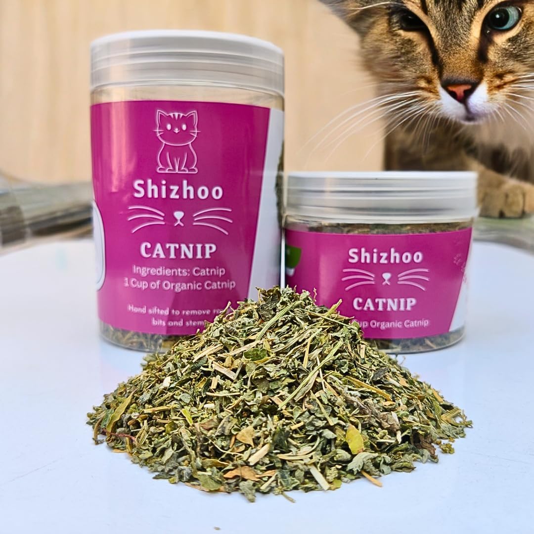 Refillable pet toy being stuffed with premium organic herb
