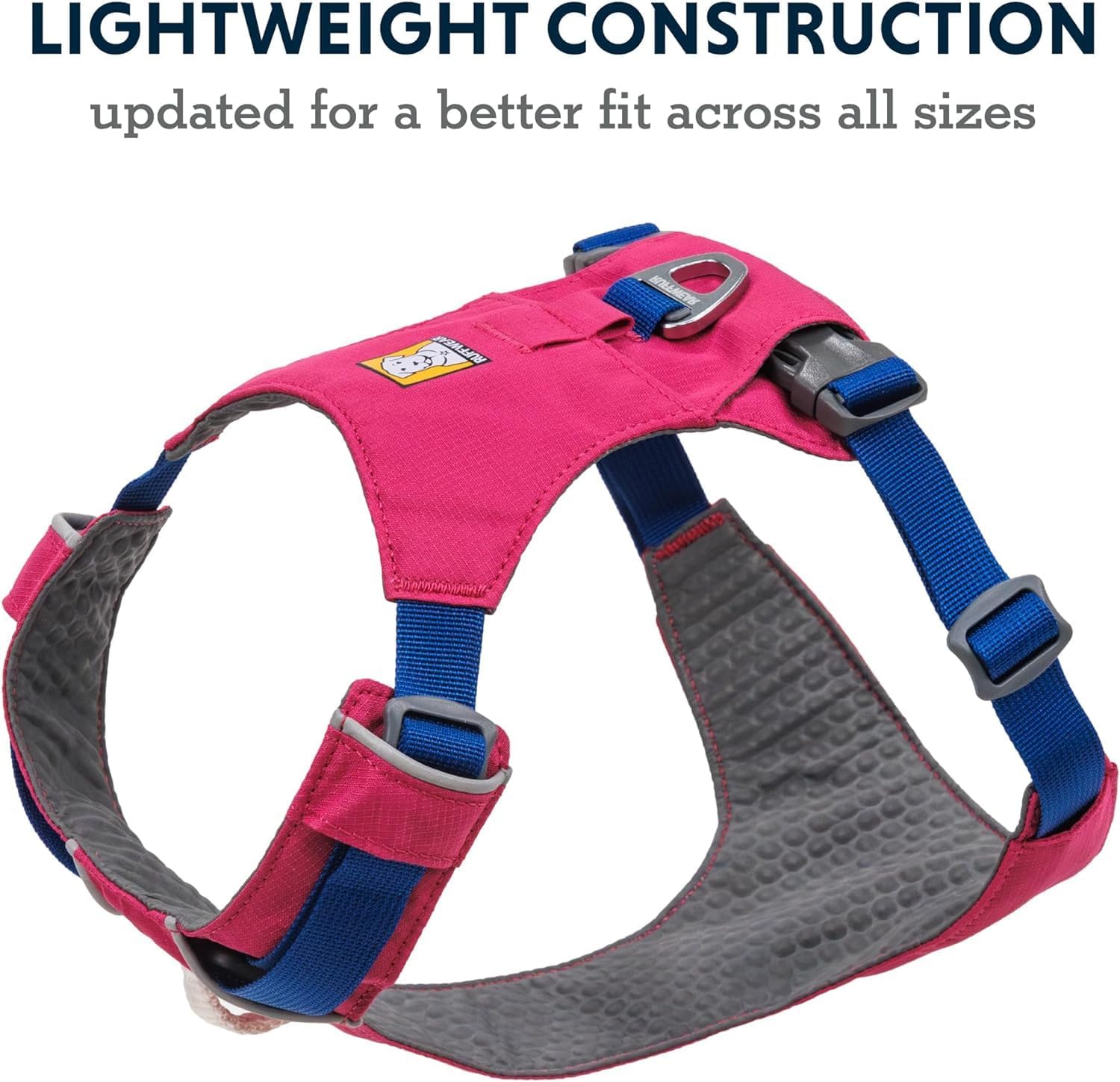 Side profile of dog wearing Alpenglow Pink Ruffwear harness
