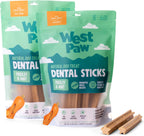 Large dog playing with a durable West Paw Dental Stick