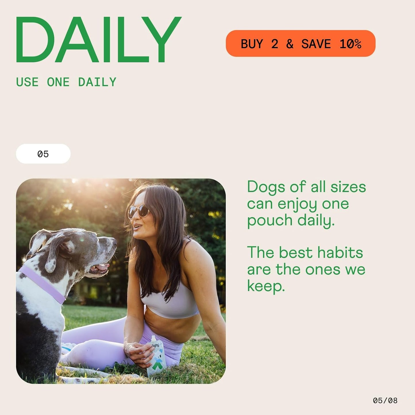 Hand squeezing Rigby organic dog treat onto kibble