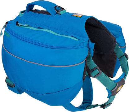 Ruffwear Approach Dog Backpack in Blue Dusk front view on a hiking trail.