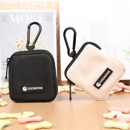 Coowone spill-proof puppy treat container showing the smooth zipper mechanism open with snacks inside.