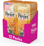 Cat eating Inaba tuna and chicken meal topper