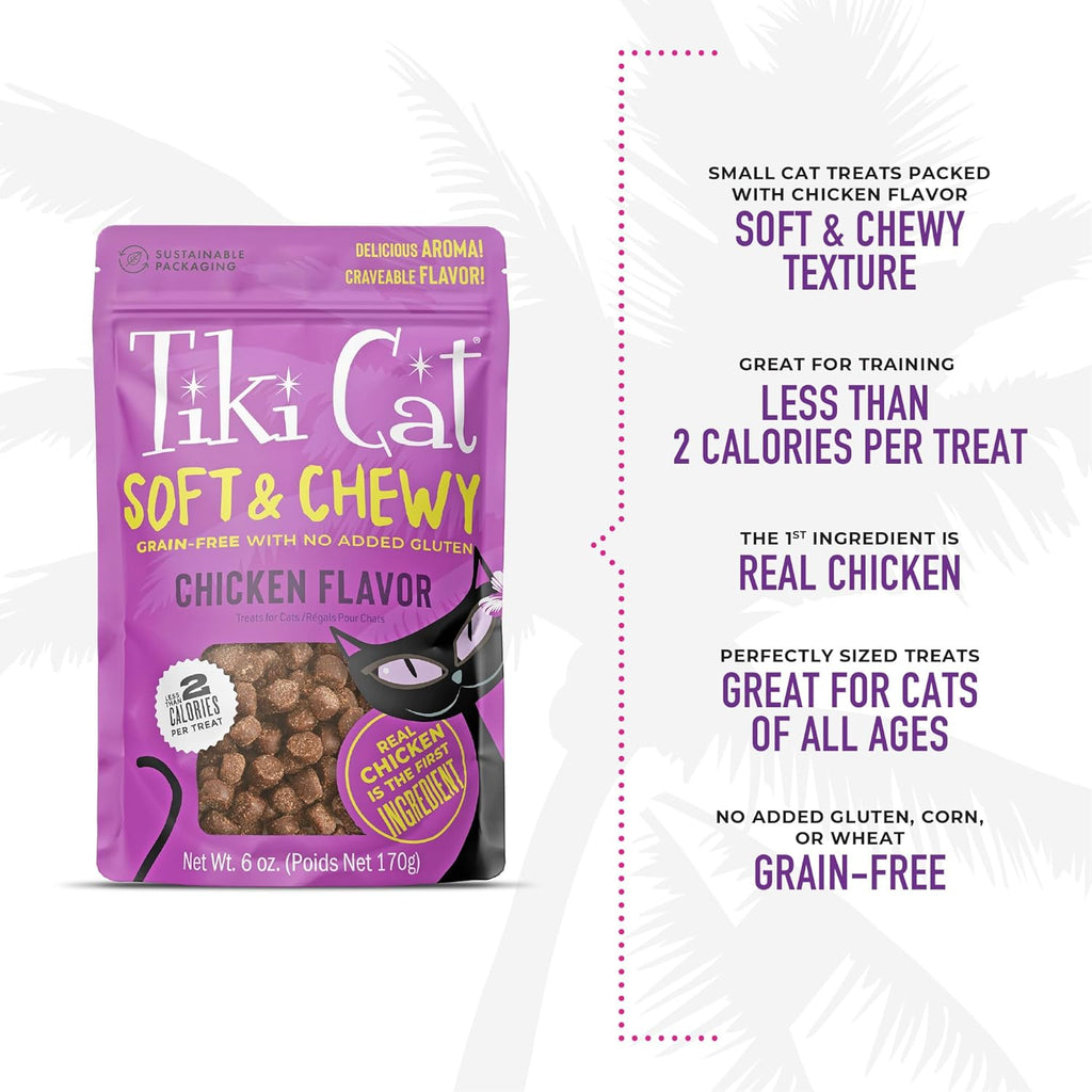 Domestic cat eating Tiki Pets soft chicken treat