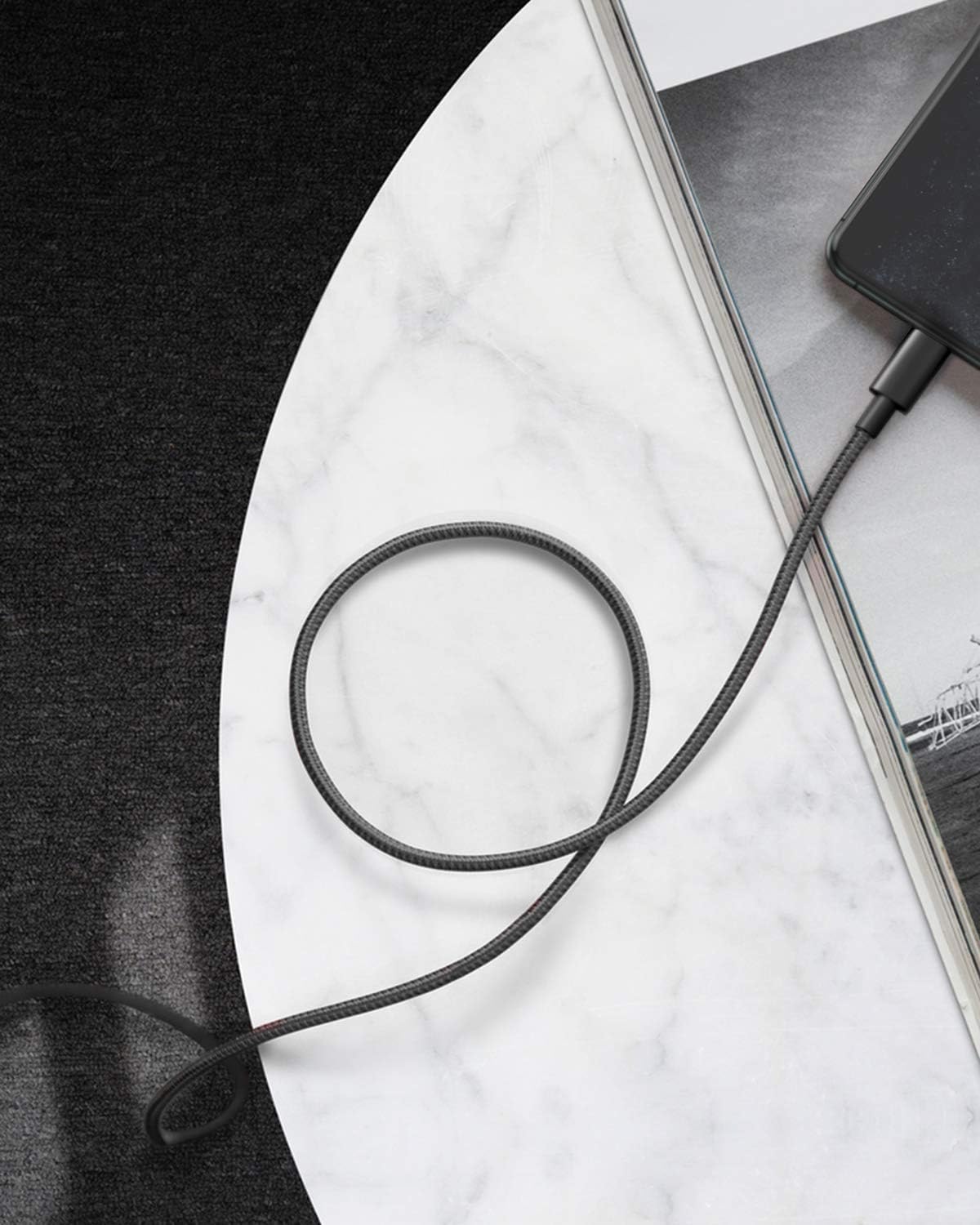 Authentic USA imported Anker double braided nylon cable rolled up neatly with its integrated strap.