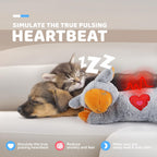 Puppy snuggling with All For Paws heartbeat comfort toy