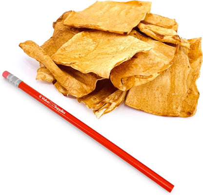 ValueBull chicken infused dog rawhide chips spread out on a flat surface