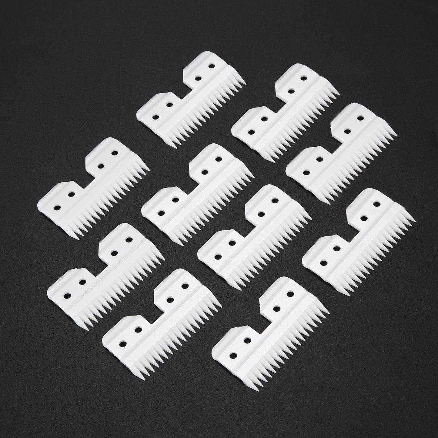 Close up view of white replacement ceramic cutter for grooming