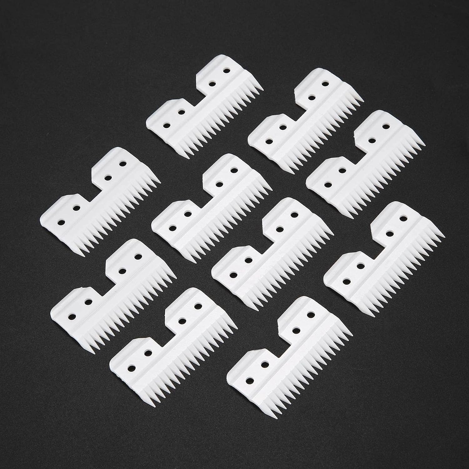 Close up view of white replacement ceramic cutter for grooming