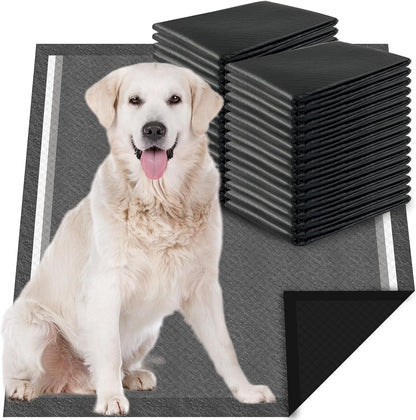 Dogcator charcoal pet underpads being unfolded for indoor housebreaking use.