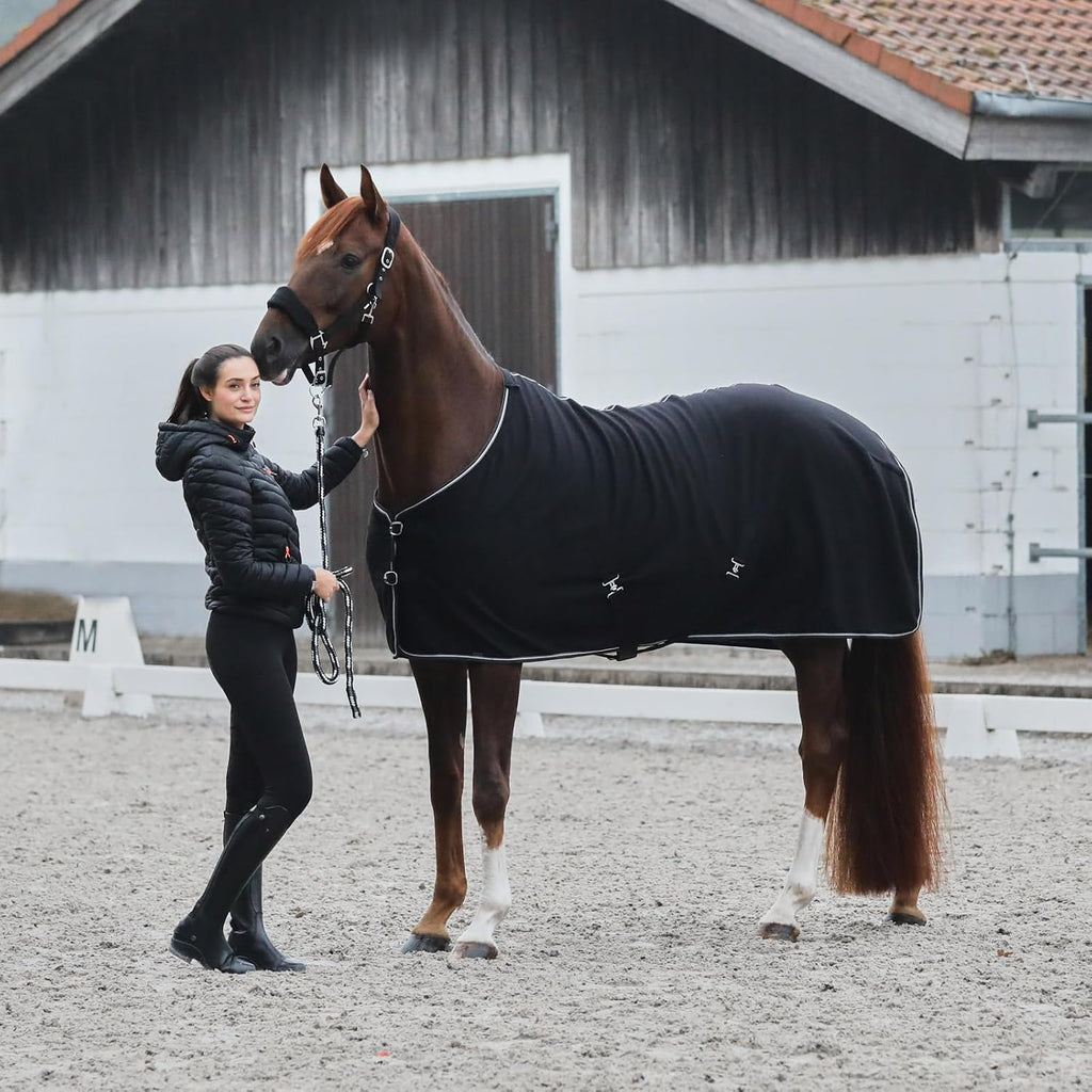 Quick dry polar fleece horse rug showing secure tail cord attachment