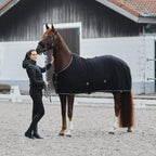 Quick dry polar fleece horse rug showing secure tail cord attachment