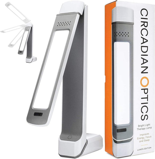 Circadian Optics Lumos 2.0 bright light therapy desk lamp front view showing the sleek white folding panel.