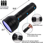 Handheld ultraviolet black light torch illuminating dried pet urine stains on a living room carpet.