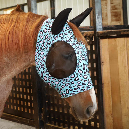 Full size horse wearing Party Cheetah fly mask in pasture
