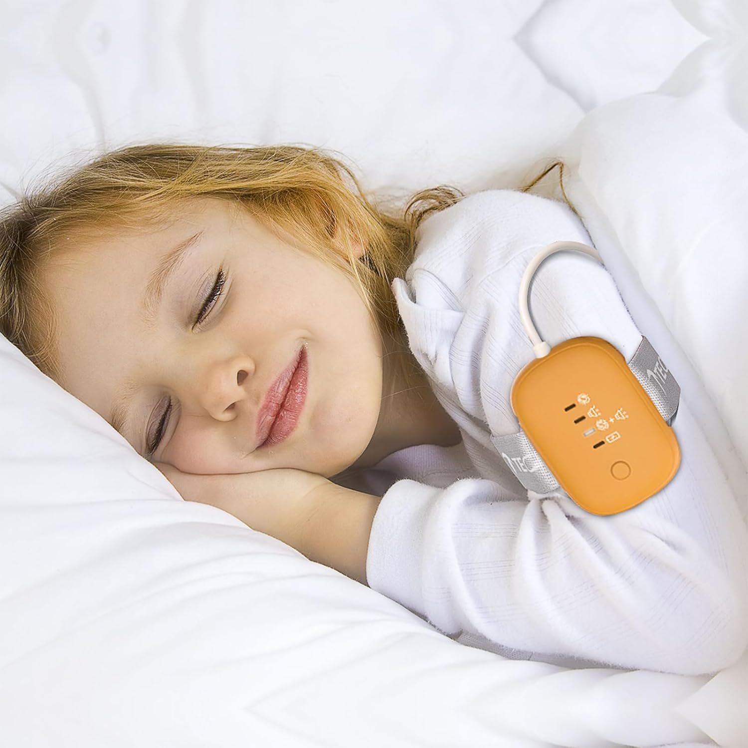 Fency Bed Wetting Alarm front view orange potty training device.