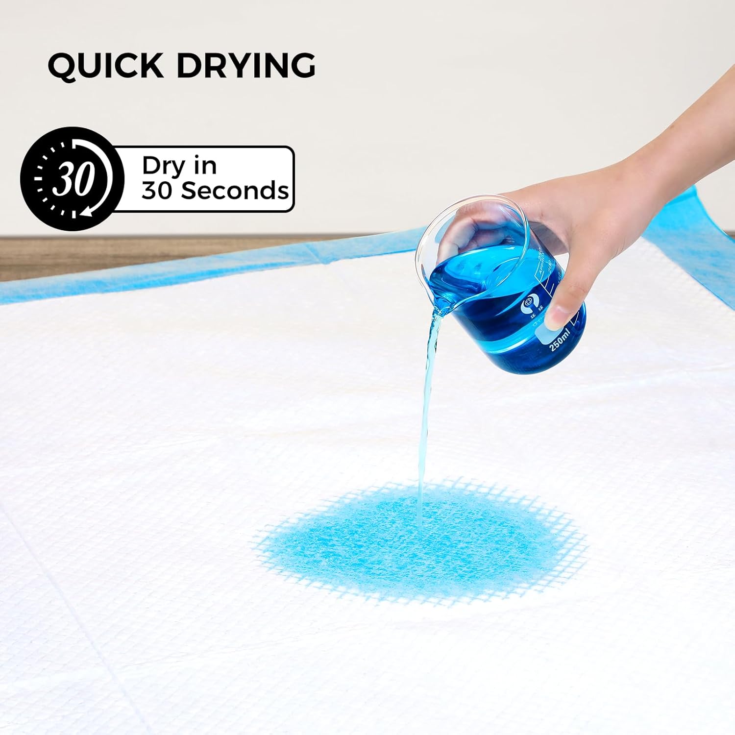 Dogcator quick dry disposable doggy training pad being placed inside a large pet crate.
