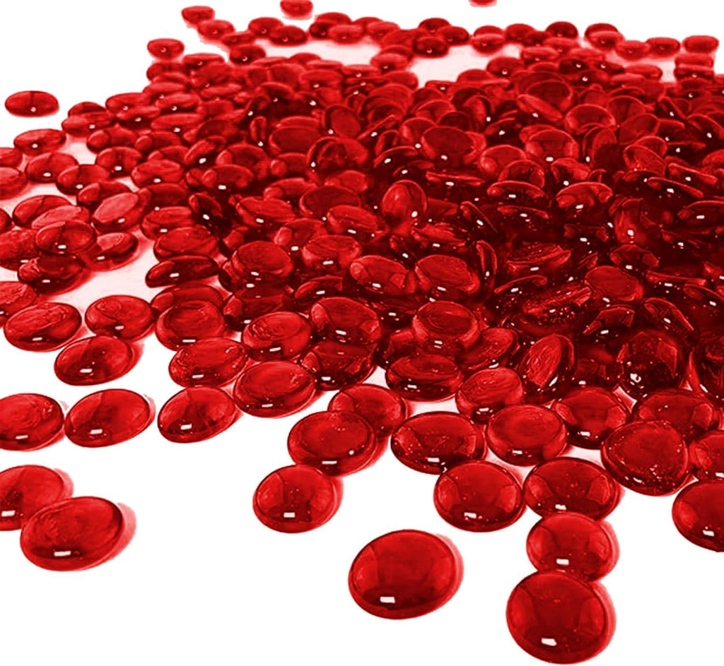 Arsuk red glass pebbles in a clear glass vase