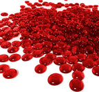Arsuk red glass pebbles in a clear glass vase