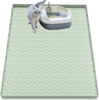 Multiuse gray silicone mat being used as a pet feeding tray