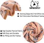 Three different colored soft fleece pet throws in brown pink and white arranged together.