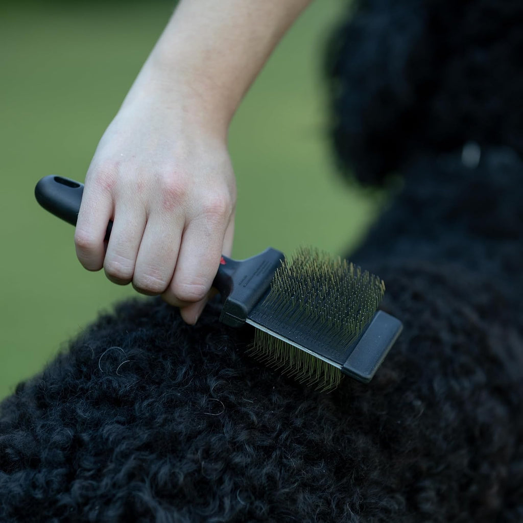 Jeffers pet detangler brush for dogs and cats with ergonomic non slip handle