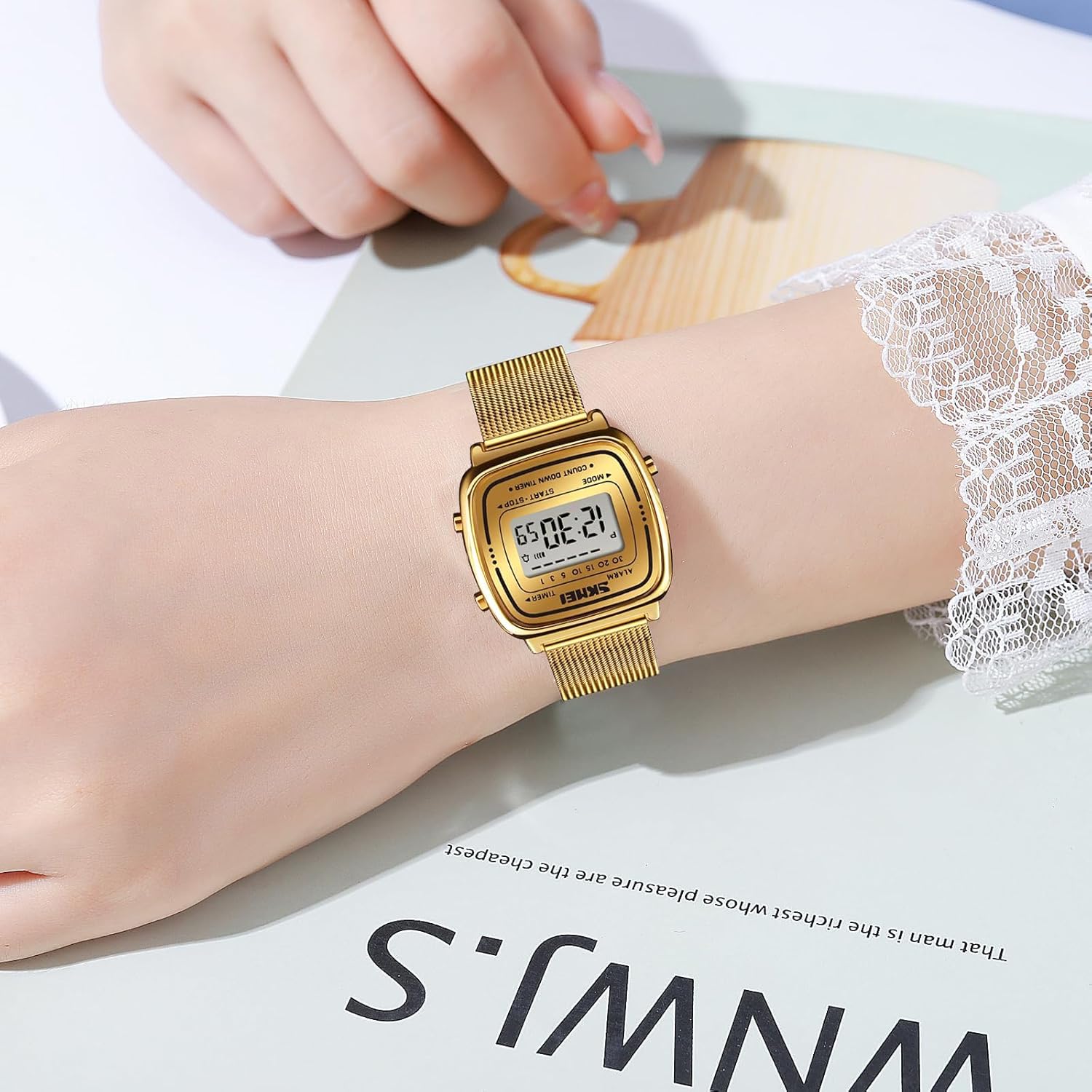Lifestyle view of the petite simple watch being worn on a woman's wrist for formal styling.