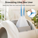 Thick drawstring replacement cat litter bags being pulled out of a box.