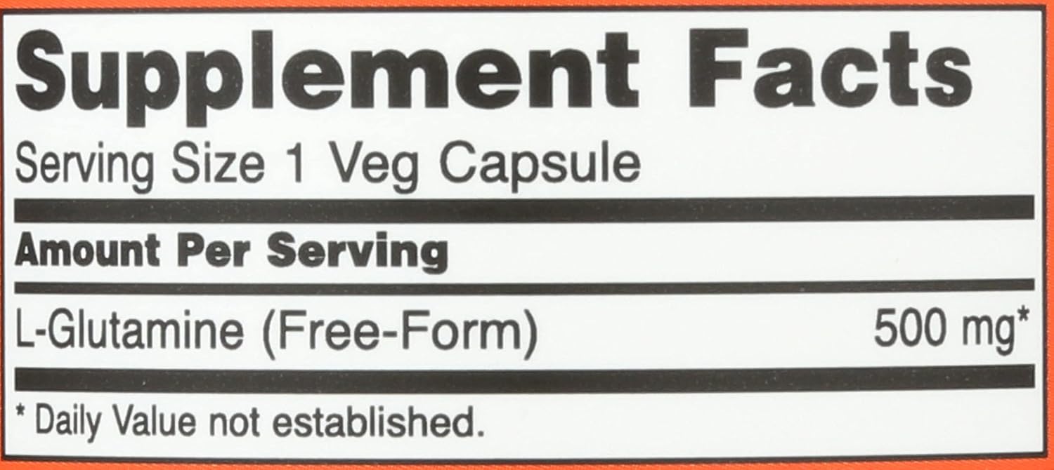 Close-up of the supplement facts panel on the back of NOW Foods L-Glutamine 120 count bottle detailing amino acid ingredients.