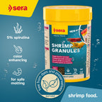 Sinking aquarium diet for freshwater shrimp showing granule texture.