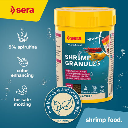 Sinking aquarium diet for freshwater shrimp showing granule texture.
