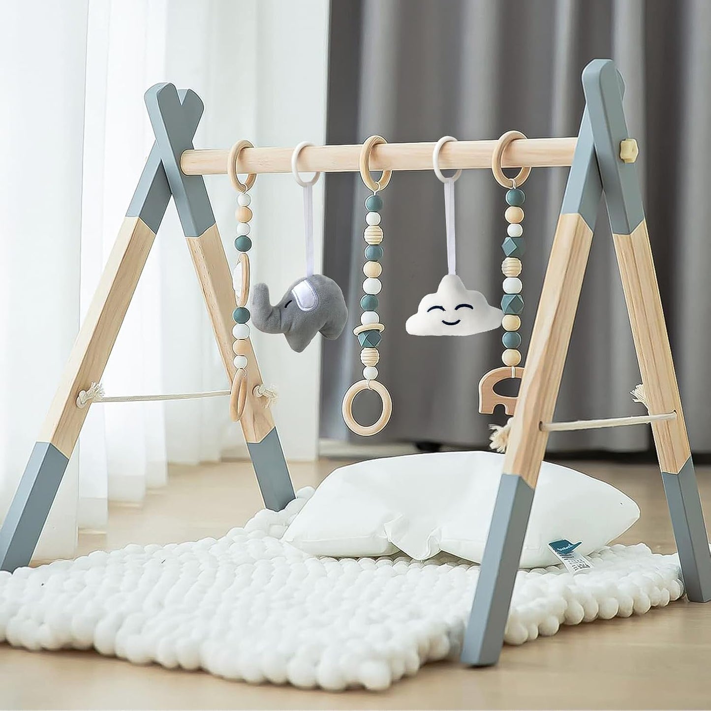 Avrsol wooden baby play gym foldable grey front view with hanging toys