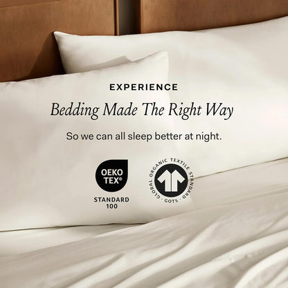 Side view of the Shore colored organic cotton fitted sheet on a deep mattress