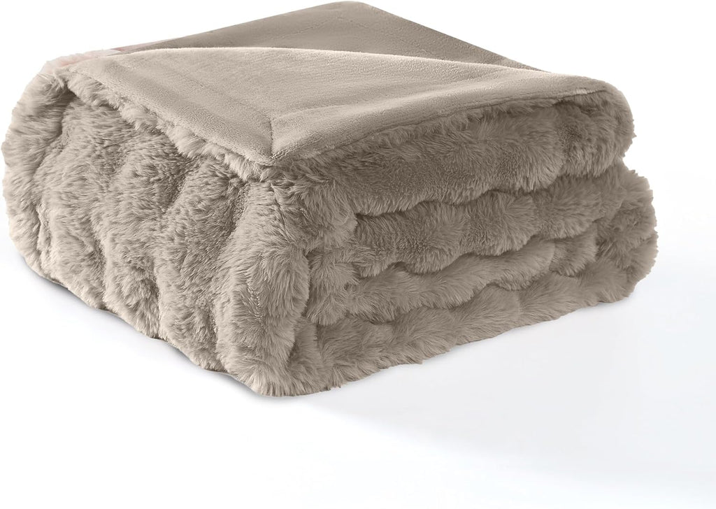Premium imported water resistant pet blanket displayed in a modern living room setting.