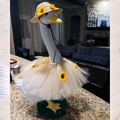 Weatherproof festive goose sculpture outfit with miniature sunglasses.