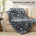 Washable fluffy pet furniture protector spread out on a bed