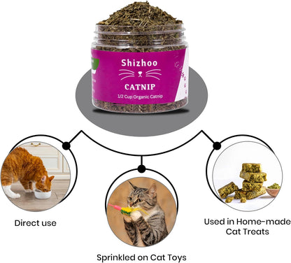Squeezing loose organic catnip flakes to release aromatic pet attractant oils