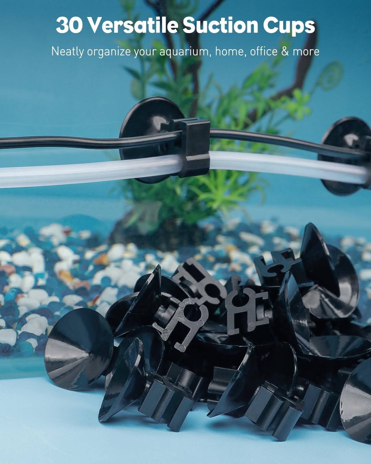 Black fish tank hose holder clips attached to glass wall holding air line